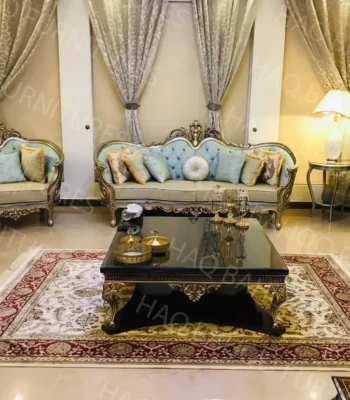 Stunning royal seven seater sofa design with teal velvet button-tufted backrest and gold carved rosewood frame by Haq Bahoo Furniture