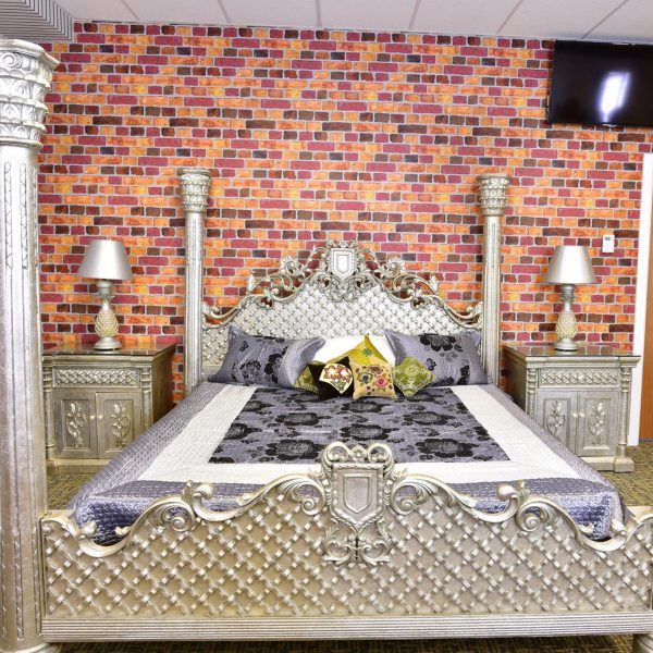 Silver four-poster bed set with dresser and bedside tables by Haq Bahoo Furniture – luxury bedroom furniture alternative to NM Furniture