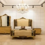 Luxury hand-carved wooden bed set with glossy finish and upholstered headboard – delivery available in Lahore