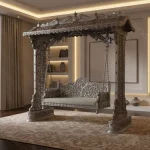 Handmade silver jhula for home with see-through carved pillars and a beautiful dolly seat designed for indoor living rooms