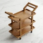 Handcrafted rolling cart organizer with solid wood tiers and wheels by HBFurnitures, handmade three-tier storage trolley for home use.