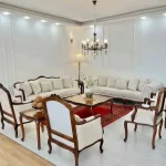 Luxury sheesham wood sofa set with cream upholstery and carved cabriole legs by Haq Bahoo Furniture, handmade in Chiniot Pakistan