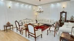 Luxury sheesham wood sofa set with cream upholstery and carved cabriole legs by Haq Bahoo Furniture, handmade in Chiniot Pakistan