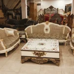 Royal carved victorian sofa set in cream and gold finish with sheesham wood frame and floral upholstery by Haq Bahoo Furniture